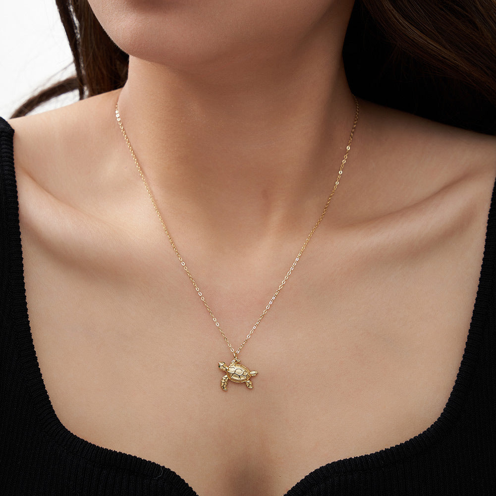 Gold Stainless Steel Sea Turtle Pendant Necklace, Textured Tortoise Charm with Green CZ Eyes on Thin Rolo Cable Chain
