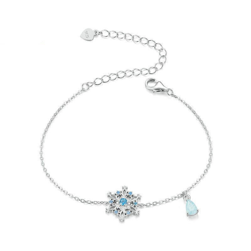 Pulsera de plata de ley 925 con forma de copo de nieve para regalar en las fiestas.