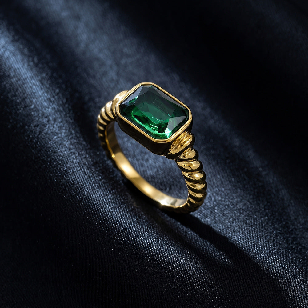 Stainless Steel Gold Plated Twisted Band Ring with Rectangle Emerald Green CZ Stone