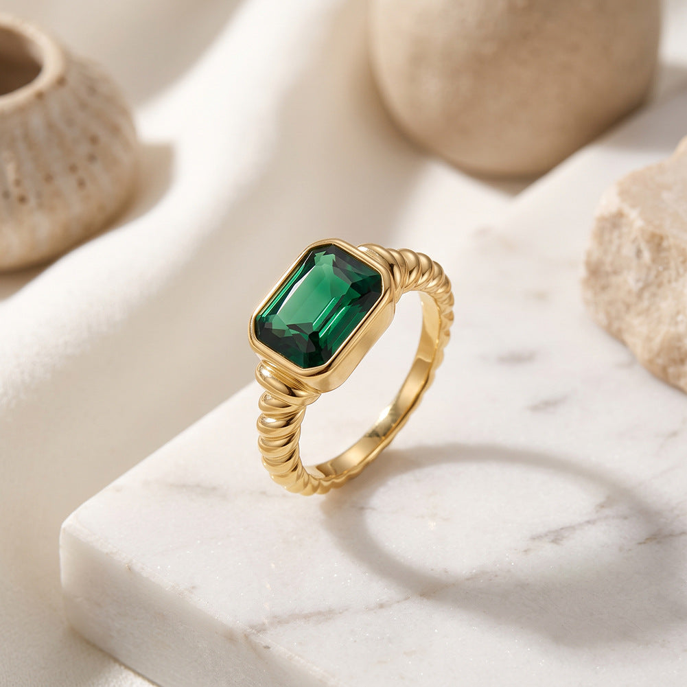 Stainless Steel Gold Plated Twisted Band Ring with Rectangle Emerald Green CZ Stone