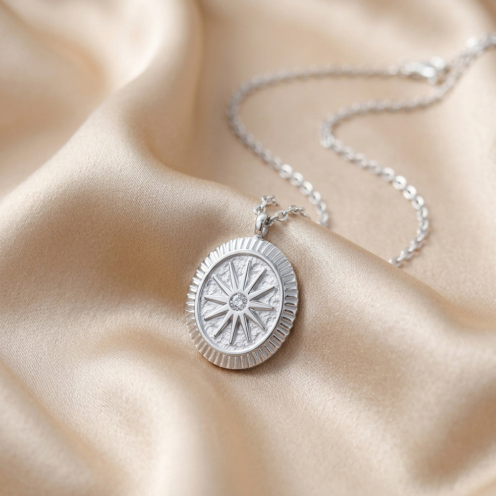 Stainless Steel Oval Sunburst Medallion Necklace, Textured Oval Sunburst Pendant with Central Sparkling CZ Stone, Vintage Hammered Surface Design