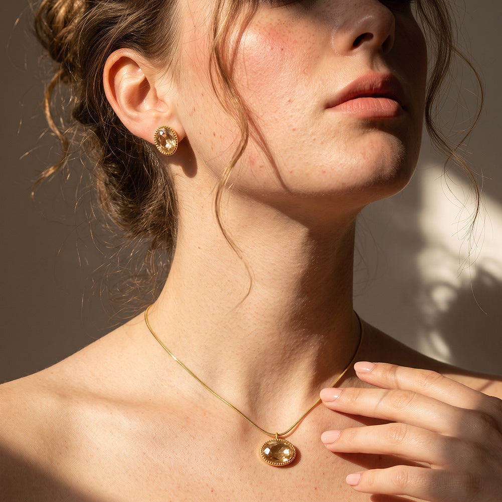 Stainless Steel Oval Champagne Crystal Snake Chain Necklace, Large Faceted Oval Champagne Crystal Stone Set in Delicate Beaded Rim, Sleek Snake Chain