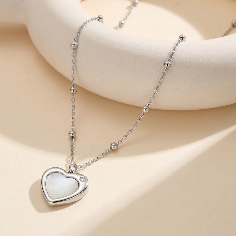 Gold Stainless Steel Heart Pendant Necklace, White Mother of Pearl Inlay Heart Charm with Single Clear CZ, Station Bead Rolo Chain
