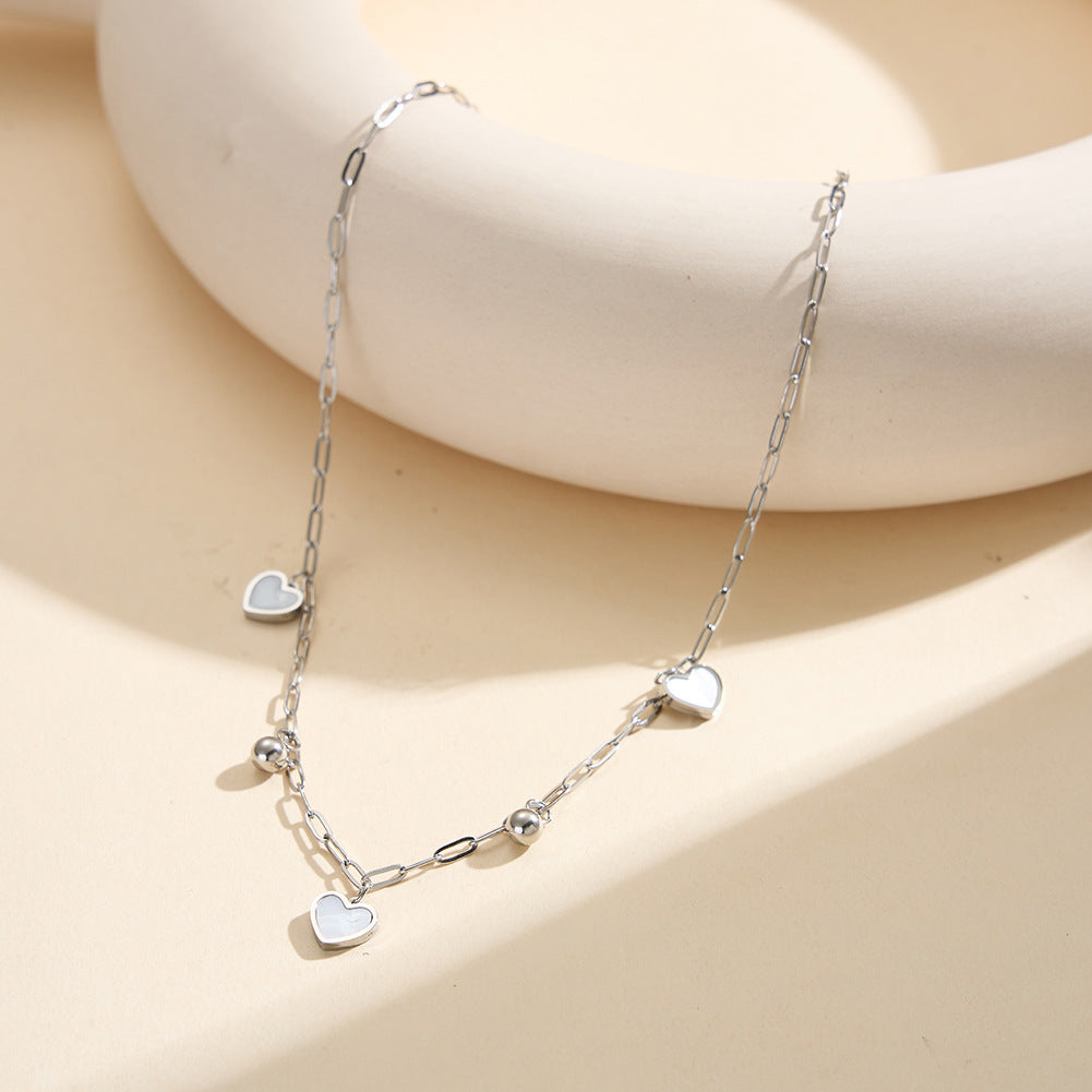 Gold Stainless Steel Paperclip Heart Necklace, White Mother of Pearl Inlaid Heart Charms and Gold Round Bead Drops