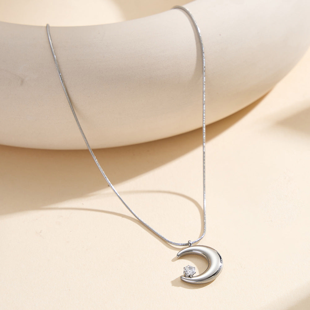 Gold Stainless Steel Crescent Moon Necklace, Polished Hollow Moon Charm with Single Round Clear CZ, Sleek Snake Chain