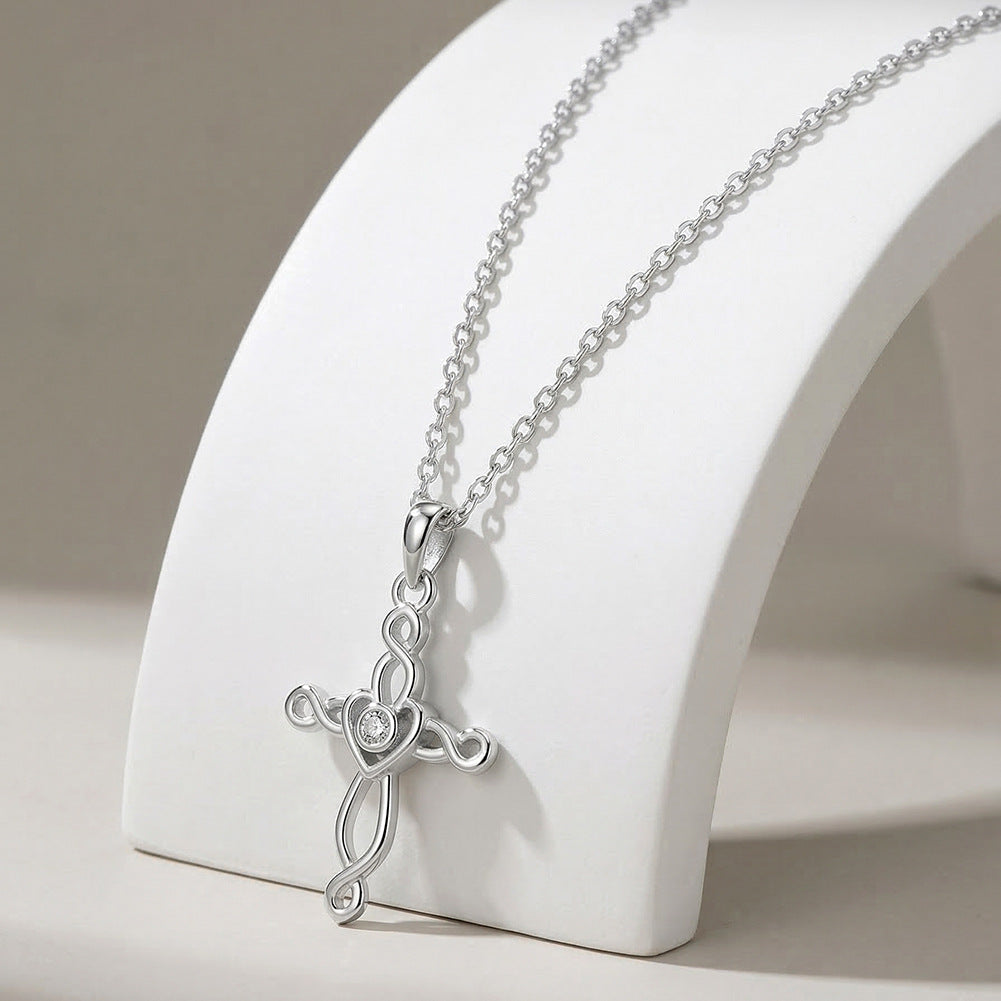 Silver Stainless Steel Hollow Twist Cross Necklace, Intertwined Heart Cross Pendant With Center CZ Stone** 银色不锈钢镂空扭纹十字架项链，缠绕爱心十字，中心镶嵌锆石吊坠