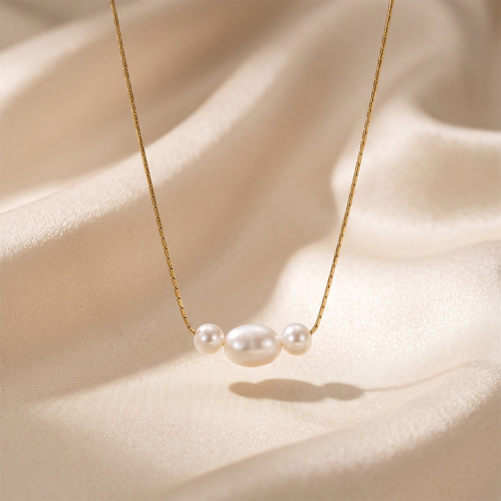Three Bead Glossy Rice Freshwater Pearl Necklace, Central Large Oval Pearl with Round Side Pearls Gold Paperclip Chain