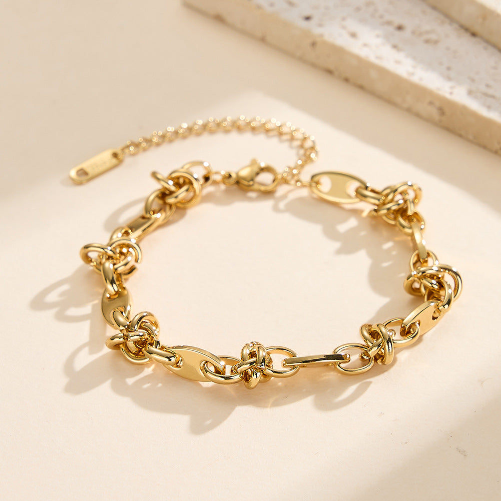 Gold Plated Stainless Steel Knotted Link Bracelet, Oval Paperclip Links with Hand Tied Knot Details, Adjustable