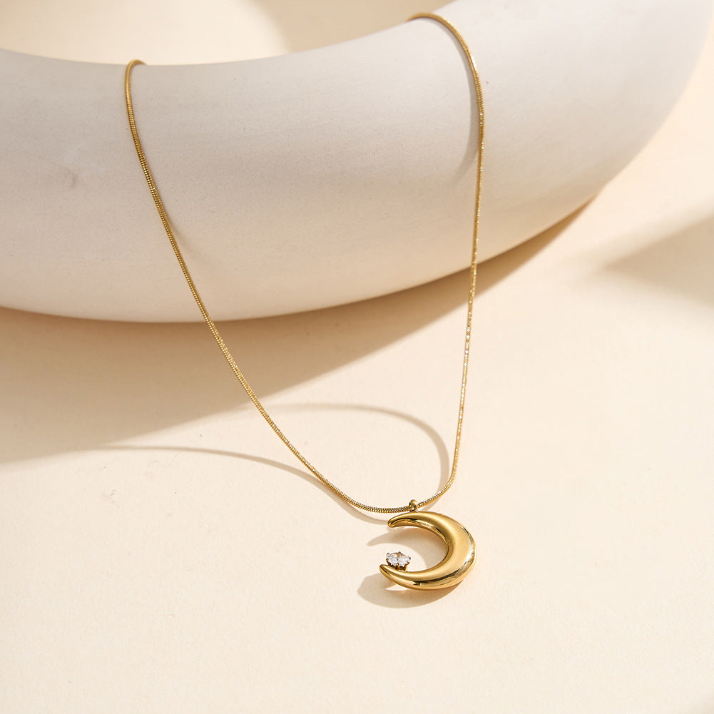 Gold Stainless Steel Crescent Moon Necklace, Polished Hollow Moon Charm with Single Round Clear CZ, Sleek Snake Chain