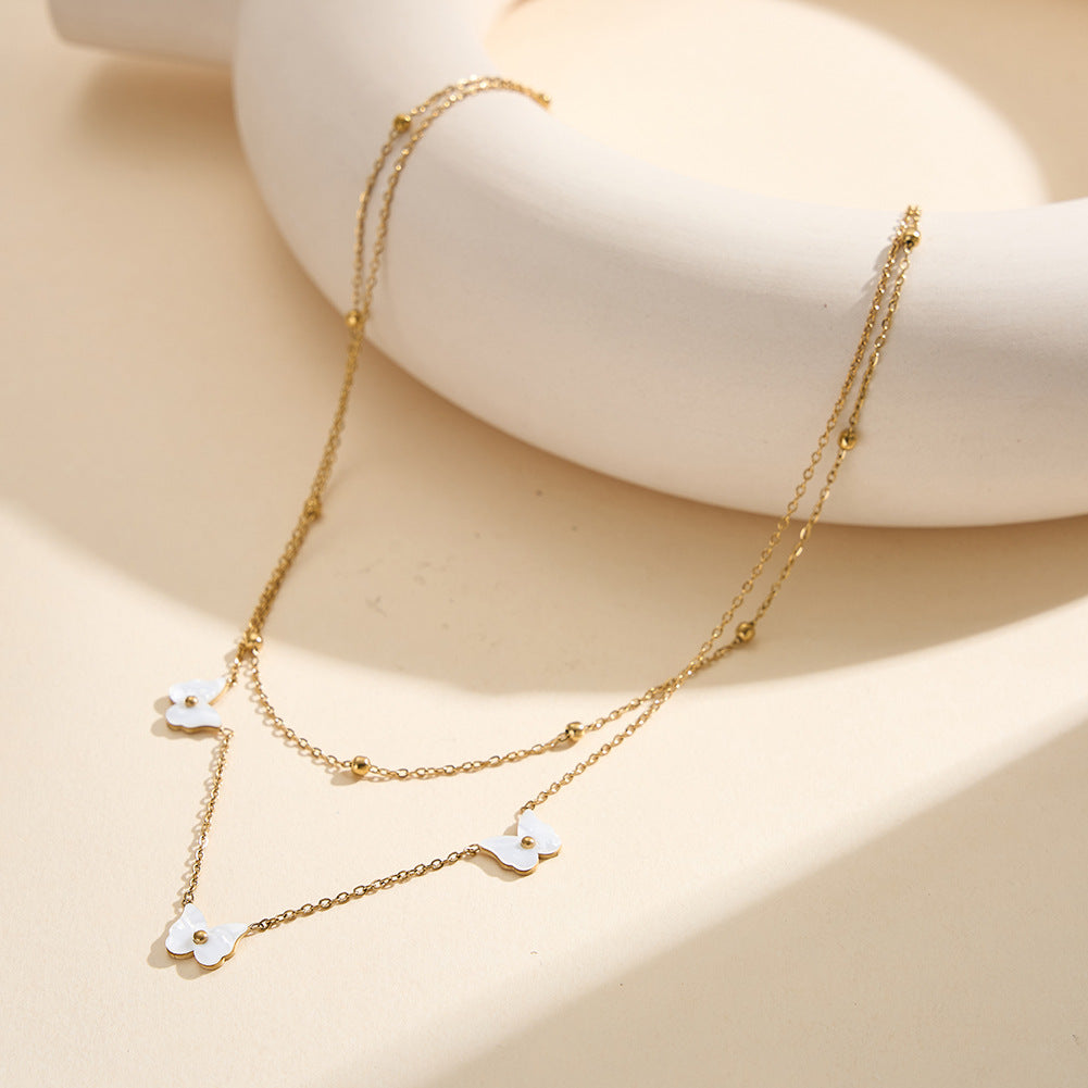 Gold Stainless Steel Double Layer Butterfly Necklace, Two-Tier Stacked Rolo Chain with White Enamel Butterfly Charms & Gold Bead Details