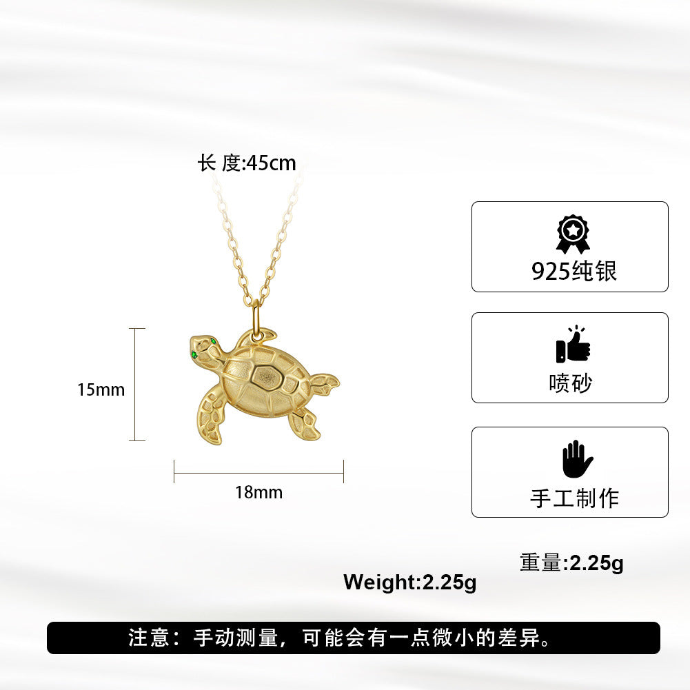 Gold Stainless Steel Sea Turtle Pendant Necklace, Textured Tortoise Charm with Green CZ Eyes on Thin Rolo Cable Chain