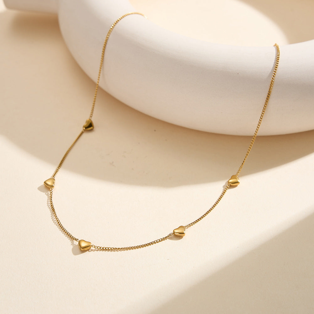 Gold Stainless Steel Multi Station Heart Necklace, Five Small Polished 3D Heart Charms Along Dainty Rolo Chain