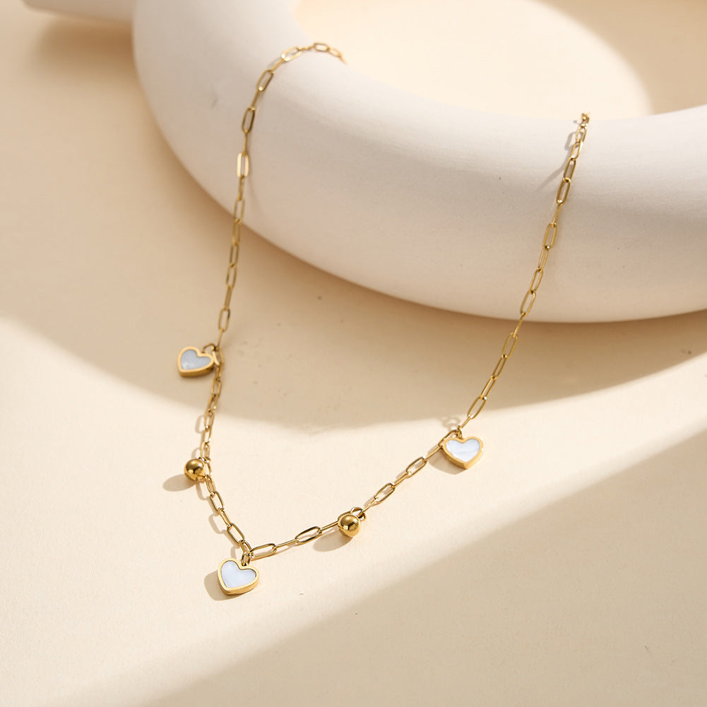 Gold Stainless Steel Paperclip Heart Necklace, White Mother of Pearl Inlaid Heart Charms and Gold Round Bead Drops