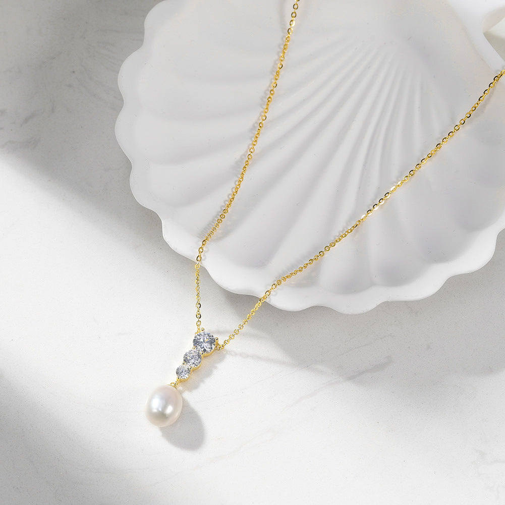 Teardrop Lustrous Freshwater Pearl Drop Necklace, Oval White Pearl with Vertical Graduated Cubic Zirconia Setting S925 Silver Chain