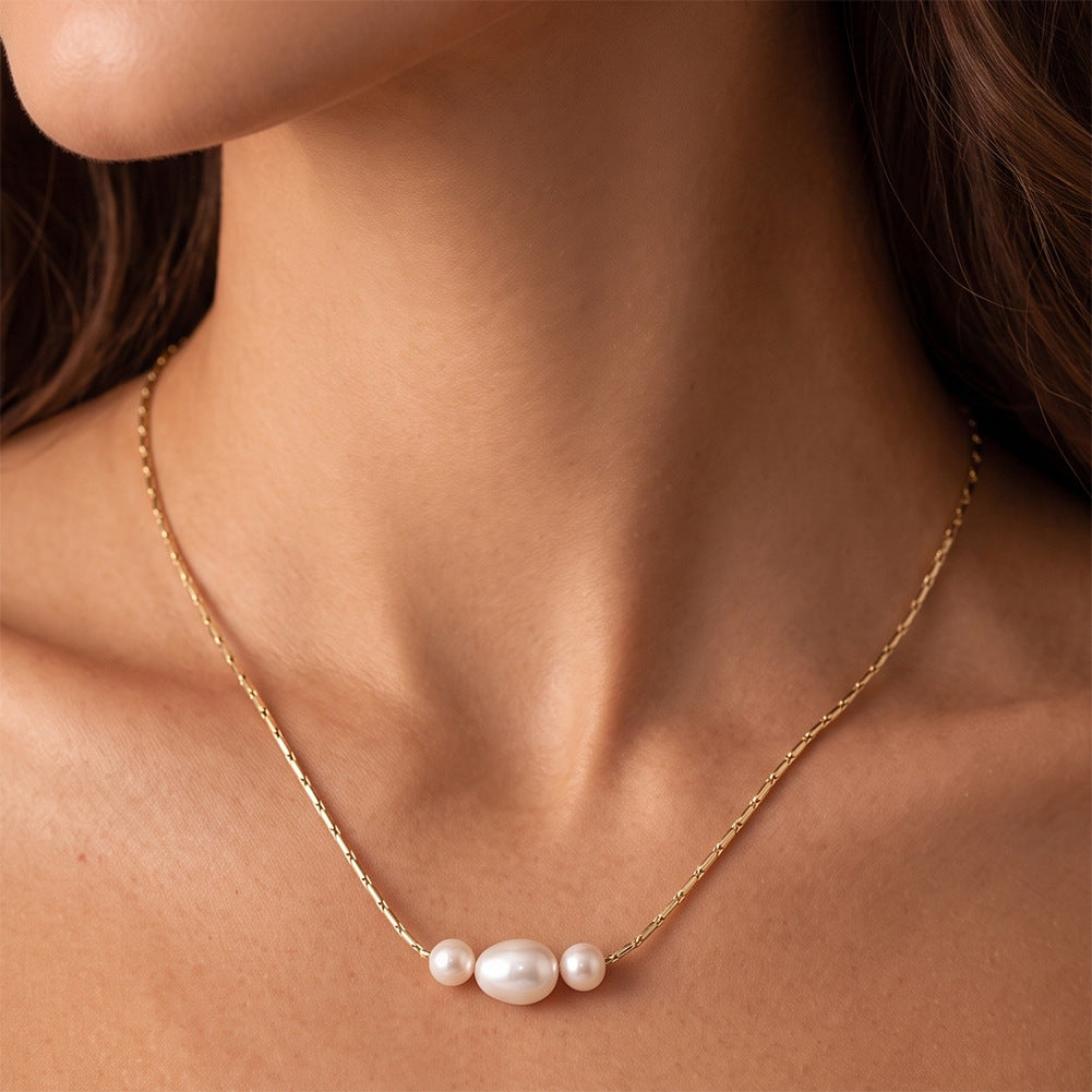 Three Bead Glossy Rice Freshwater Pearl Necklace, Central Large Oval Pearl with Round Side Pearls Gold Paperclip Chain