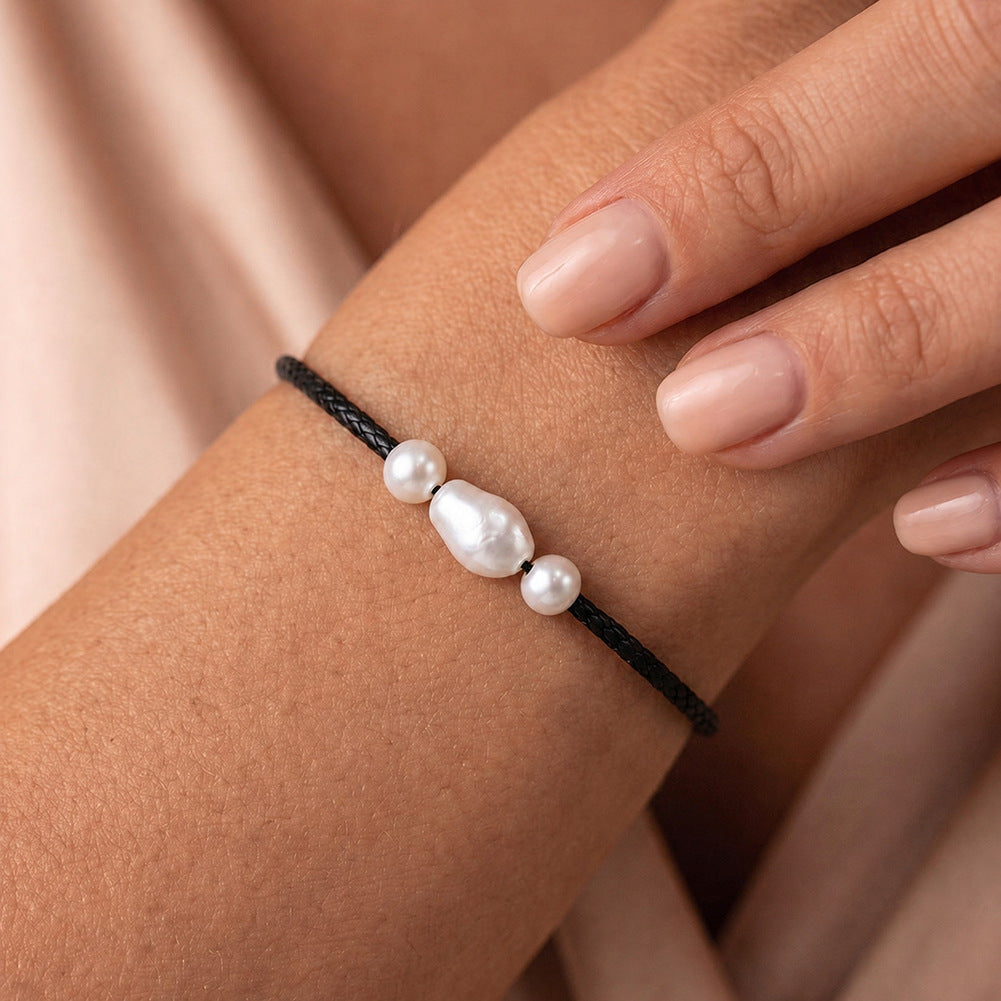 Adjustable Black Wax Cord Bracelet, Lustrous Baroque Freshwater Pearl Center Flanked by Two Small Round Pearls, Sliding Knot Design