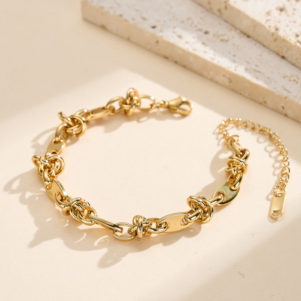 Gold Plated Stainless Steel Knotted Link Bracelet, Oval Paperclip Links with Hand Tied Knot Details, Adjustable