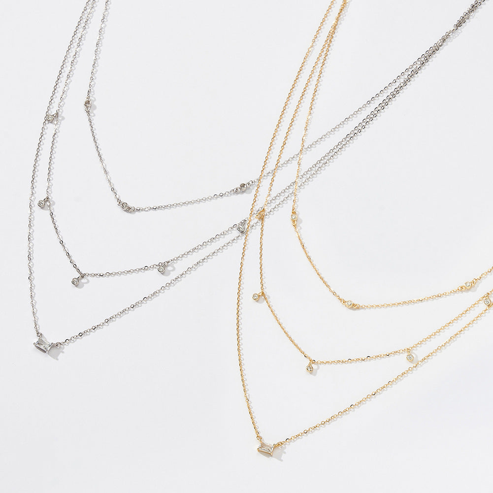 Gold Stainless Steel Triple Layer CZ Necklace, Multi Strand Chain with Round and Baguette Cut Cubic Zirconia