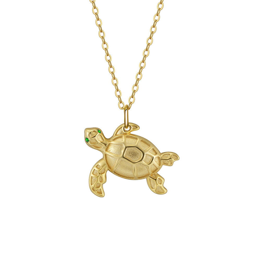 Gold Stainless Steel Sea Turtle Pendant Necklace, Textured Tortoise Charm with Green CZ Eyes on Thin Rolo Cable Chain