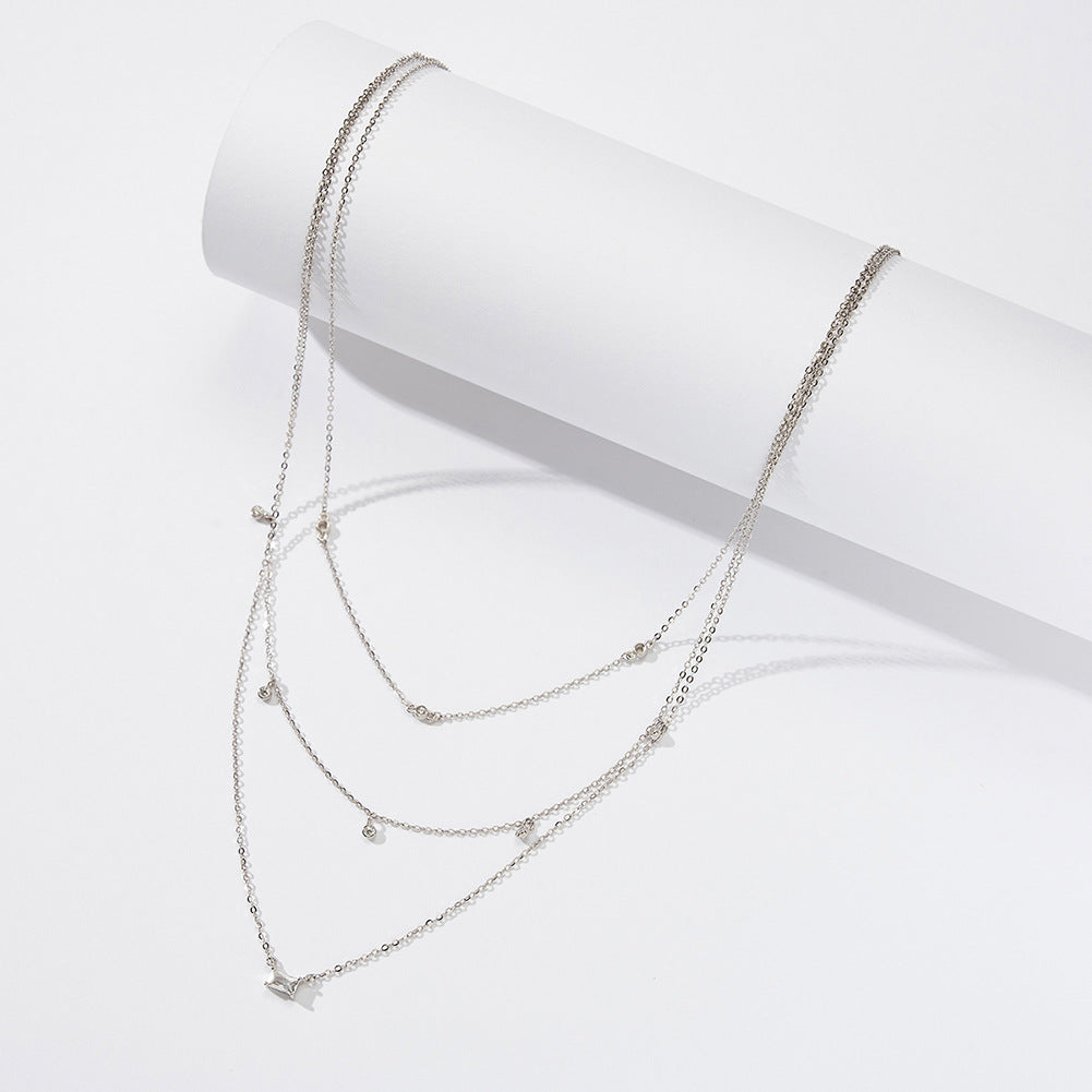 Gold Stainless Steel Triple Layer CZ Necklace, Multi Strand Chain with Round and Baguette Cut Cubic Zirconia