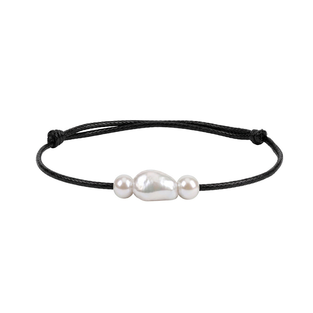 Adjustable Black Wax Cord Bracelet, Lustrous Baroque Freshwater Pearl Center Flanked by Two Small Round Pearls, Sliding Knot Design
