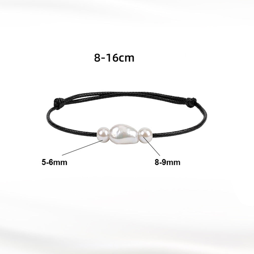 Adjustable Black Wax Cord Bracelet, Lustrous Baroque Freshwater Pearl Center Flanked by Two Small Round Pearls, Sliding Knot Design